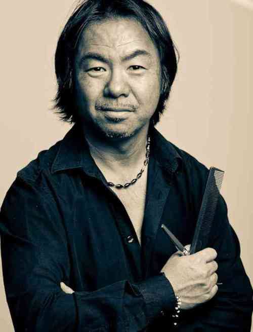 Yoshi Hagiwara holding his comb and shears